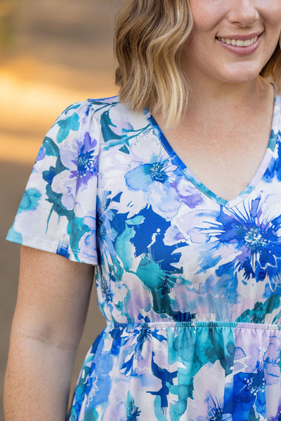 emery blue floral ruffle top womens short sleeve top